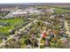 Overhead aerial view of a residential neighborhood featuring mature trees and a school nearby at 1736 Sandoval Ct, Indianapolis, IN 46214