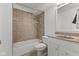 Bathroom featuring a bathtub, shower, vanity, toilet and neutral color palette at 1736 Sandoval Ct, Indianapolis, IN 46214