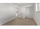 Bedroom featuring a closet and nearby laundry room, all enhanced by natural light at 1736 Sandoval Ct, Indianapolis, IN 46214