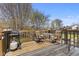 Outdoor living: Large deck with grill and comfortable seating for outdoor enjoyment at 1736 Sandoval Ct, Indianapolis, IN 46214