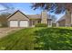 Charming single-Gathering home featuring a two-car garage and a stone chimney at 1736 Sandoval Ct, Indianapolis, IN 46214