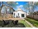 This outdoor space features a wood deck, grassy areas, and a fenced perimeter at 1818 Orleans St, Indianapolis, IN 46203