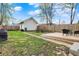 This outdoor space features a wood deck, grassy areas, and a fenced perimeter at 1818 Orleans St, Indianapolis, IN 46203