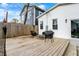 Relax on the wooden deck in this cozy backyard, complete with outdoor seating and a well-maintained lawn at 1818 Orleans St, Indianapolis, IN 46203