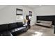 Bonus room with dark sofa and arcade game at 1818 Orleans St, Indianapolis, IN 46203