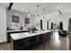 Bright kitchen with an island and breakfast bar, stainless appliances, open to living spaces at 1818 Orleans St, Indianapolis, IN 46203