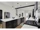 Spacious kitchen featuring a large island, stainless steel appliances, and laminate flooring at 1818 Orleans St, Indianapolis, IN 46203