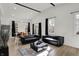 Living area filled with natural light, modern furniture, and seamless indoor-outdoor flow at 1818 Orleans St, Indianapolis, IN 46203