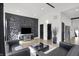 Modern living area with sleek design, natural light, and access to other areas of the home at 1818 Orleans St, Indianapolis, IN 46203