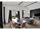 Open floor plan showing the dining area, living area with vaulted ceilings, and backyard access at 1818 Orleans St, Indianapolis, IN 46203