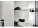 Well-organized walk-in closet with ample shelving and hanging space, offering a clean, modern aesthetic at 1818 Orleans St, Indianapolis, IN 46203