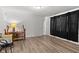 Bright living room featuring a decorative table lamp, sleek flooring, and modern décor at 1842 W Kessler Blvd N Dr, Indianapolis, IN 46228