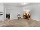 Inviting living room with neutral decor, wood flooring, and unique wood accents at 1842 W Kessler Blvd N Dr, Indianapolis, IN 46228