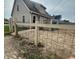 A fenced backyard and a view of the back of the house at 205 S 8Th St, Noblesville, IN 46060