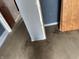 Damaged floor of a bedroom with blue walls at 205 S 8Th St, Noblesville, IN 46060