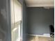 A bedroom with a window and dark paint at 205 S 8Th St, Noblesville, IN 46060