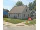 Charming two-story home with a well-maintained lawn on a corner lot at 205 S 8Th St, Noblesville, IN 46060