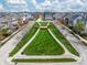 A scenic aerial view of a Primary-planned community featuring lush landscaping, manicured lawns, and beautiful single-Gathering homes at 2197 Duke Of York St, Carmel, IN 46032