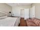 Bright bedroom boasts hardwood floors and easy access to closet at 2197 Duke Of York St, Carmel, IN 46032