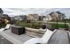 Inviting backyard featuring a manicured lawn, elegant lounge chairs, and stylish landscaping for outdoor relaxation at 2280 Meadow Crk, Avon, IN 46123