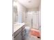 Bathroom with a quartz countertop vanity, toilet and tiled walk-in shower at 2280 Meadow Crk, Avon, IN 46123