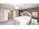 Bright Primary bedroom featuring a chandelier, and a sitting bench with access to the Primary bathroom at 2280 Meadow Crk, Avon, IN 46123