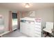 Bright bedroom features a unique loft bed with built in storage and a modern chandelier light fixture at 2280 Meadow Crk, Avon, IN 46123