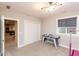 Bedroom featuring an air hockey table and a large window with gray blinds at 2280 Meadow Crk, Avon, IN 46123
