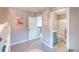 View of the bedroom leading to the ensuite bath and walk-in closet at 2280 Meadow Crk, Avon, IN 46123
