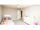 Bright bedroom features dresser and twin bed with playful decor at 2280 Meadow Crk, Avon, IN 46123