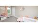 Bright bedroom with a window and view of toys at 2280 Meadow Crk, Avon, IN 46123