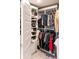 Well-organized walk-in closet with extensive shelving and hanging space for clothes and accessories at 2280 Meadow Crk, Avon, IN 46123