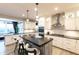 Open kitchen with island seating, modern appliances, and ample counter space at 2280 Meadow Crk, Avon, IN 46123