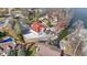 Aerial picture of property highlighting the beautiful landscaping, boat lift, waterfront access, and a private dock at 2469 Cape Henry Ct, Cicero, IN 46034