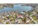 Picturesque aerial view of lakefront homes, showcasing the stunning waterfront location and neighborhood layout at 2469 Cape Henry Ct, Cicero, IN 46034