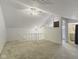 This bright attic has a partial view of an attached bathroom and stairway at 2469 Cape Henry Ct, Cicero, IN 46034