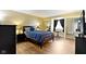 Spacious bedroom with hardwood floors, a large window, and ample closet space at 2469 Cape Henry Ct, Cicero, IN 46034