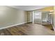 Bedroom features vinyl flooring, a window, baseboard trim, and mirrored closet doors to maximize space and light at 2469 Cape Henry Ct, Cicero, IN 46034