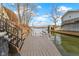 The private dock extends out into the lake, offering direct access for boating and water activities at 2469 Cape Henry Ct, Cicero, IN 46034