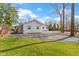 Charming exterior with a circular driveway, lawn, and trees in a well-maintained landscape at 2469 Cape Henry Ct, Cicero, IN 46034