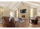 Inviting living room with fireplace, TV, comfortable seating, hardwood floors and vaulted ceilings at 2469 Cape Henry Ct, Cicero, IN 46034