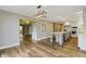 Open floor plan with dining, living, and kitchen areas providing a great space for entertaining at 2469 Cape Henry Ct, Cicero, IN 46034
