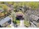 An aerial view of a two-story home with mature trees and landscaping at 315 Heritage Ct, Fishers, IN 46038