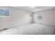 Spacious bedroom with three large windows, neutral carpeting, and light gray walls at 315 Heritage Ct, Fishers, IN 46038
