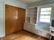 Bedroom features closet and built-in shelving around a window for display and storage at 3315 Hillcrest Dr, Columbus, IN 47203