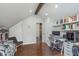 Cozy attic bedroom space featuring hardwood floors and access to the attic storage at 333 S Fourth St, Zionsville, IN 46077