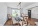 Bright dining room featuring a modern table, chairs, and a large window providing natural light at 333 S Fourth St, Zionsville, IN 46077