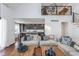 Open-concept living room with high ceilings, a loft area, and seamless connection to the modern kitchen at 333 S Fourth St, Zionsville, IN 46077