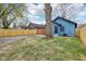 A view of a backyard featuring a new wooden fence and grass at 3433 Brouse Ave, Indianapolis, IN 46218