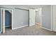 A mostly unfurnished basement area with carpeted floors at 3433 Brouse Ave, Indianapolis, IN 46218